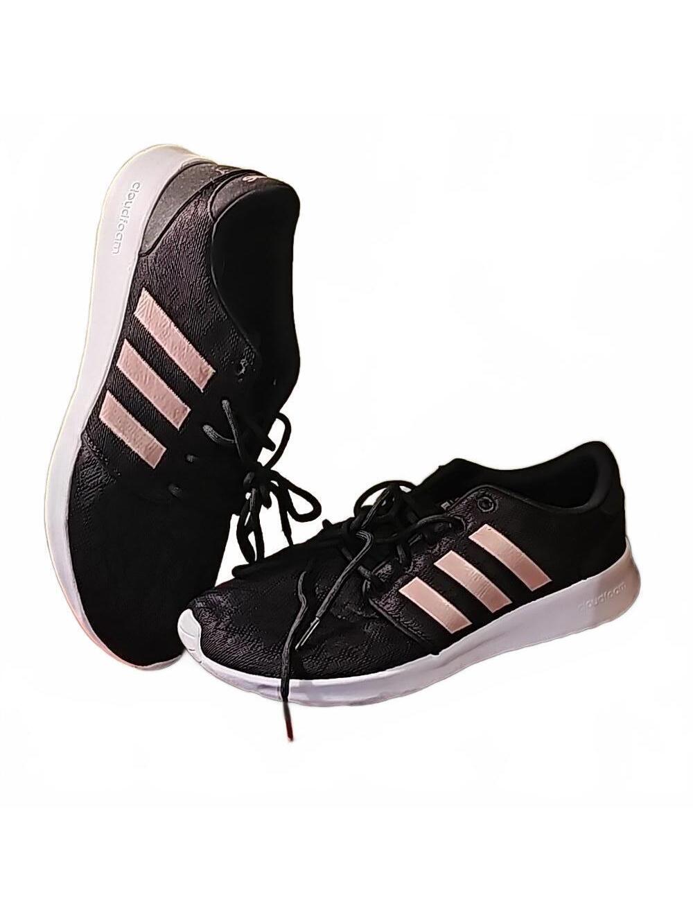 Adidas running shoes black lace overlay with rose stripes. Size 8